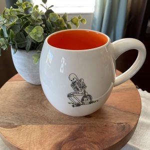 Rae Dunn "Orange inside Skeleton" mug